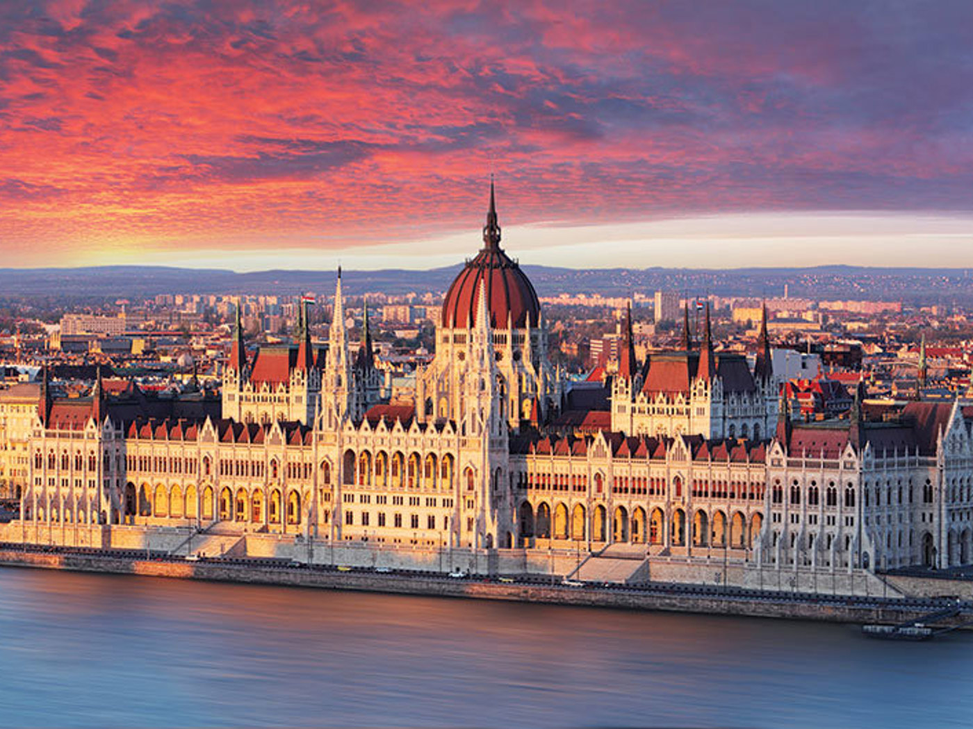 Budapest’s Parliament on the Danube at dusk, a highlight of our Classic European River Cruise