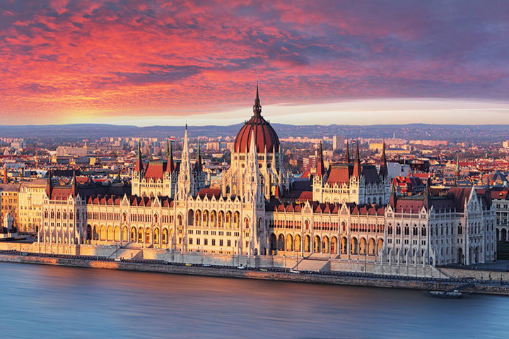 Hungarian Parliament on the Danube in Budapest at dusk