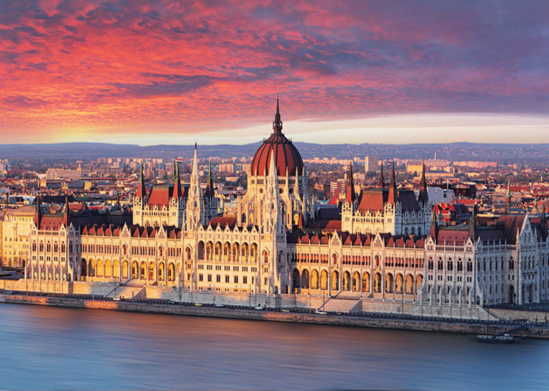 Hungarian Parliament on the Danube in Budapest at dusk