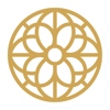 Gold Circle with floral design logo emblem